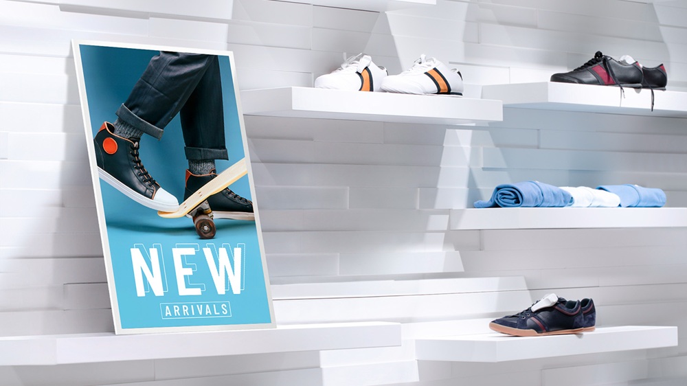 Samsung Color E-Paper display showing retail signage — thin, wireless, ultra-low power digital signage for commercial environments